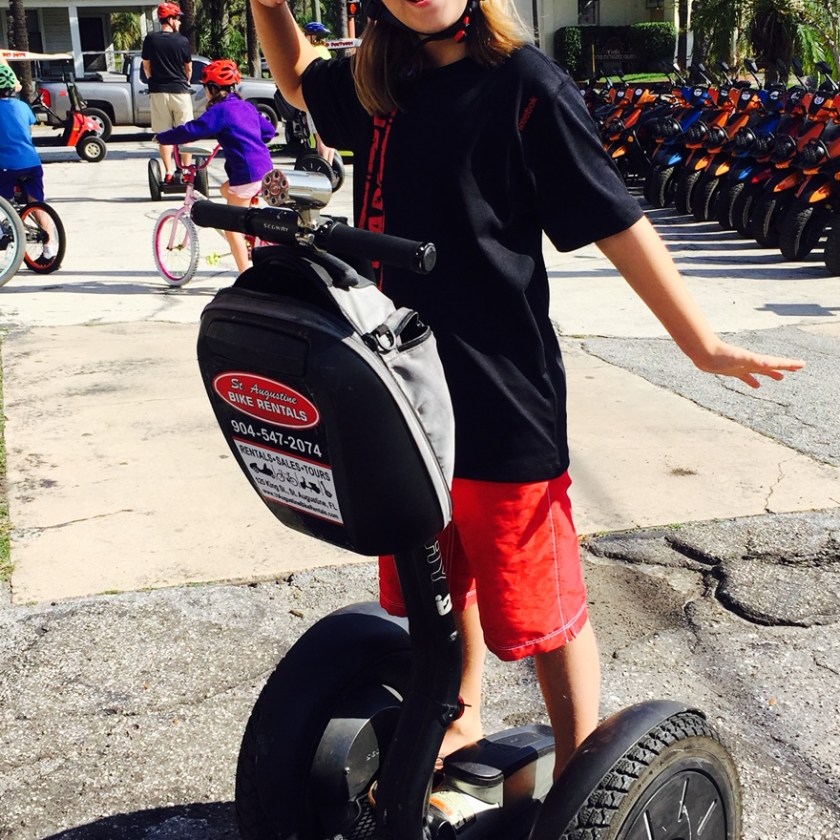 a person riding on the back of a motorcycle
