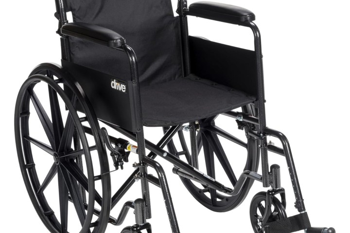 Black wheelchair with large rear wheels and footrests.