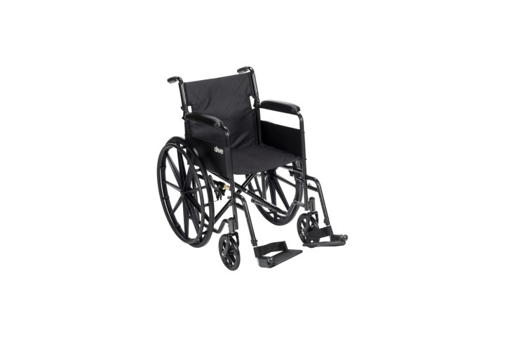 Black manual wheelchair with footrests and armrests on a white background.