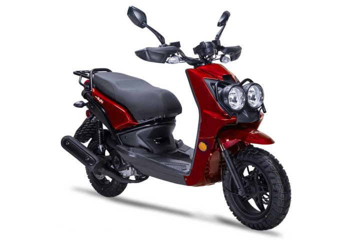 Red scooter with dual front headlights on white background.